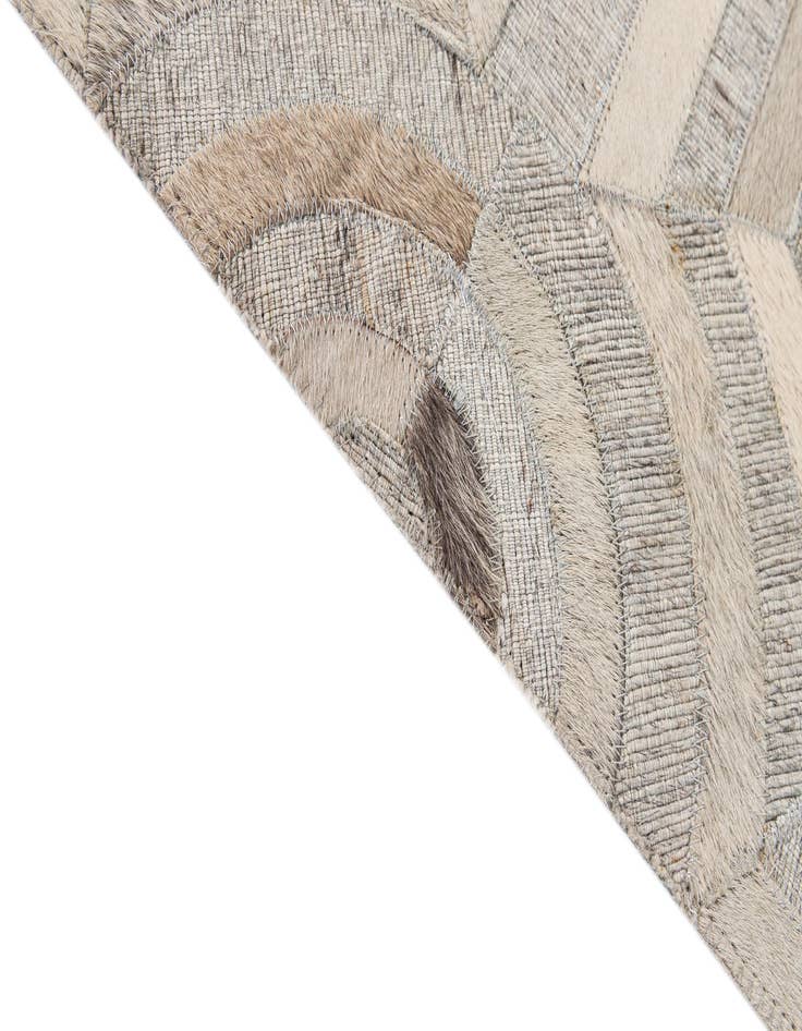 Detail image of  5' 2 x 7' 9 Cowhide - Patchwork Rug