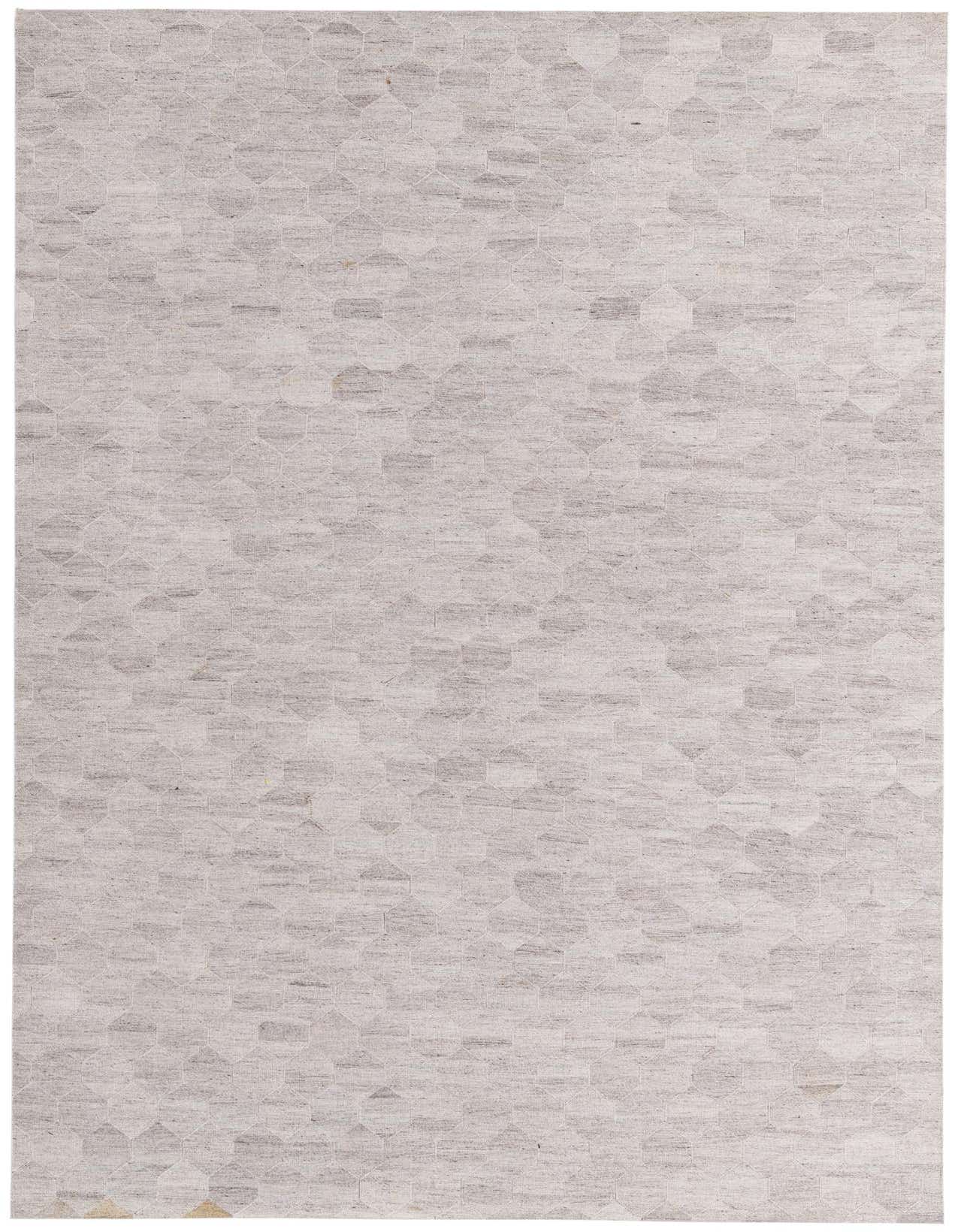 A 5x8 rectangular gray modern rug with a subtle abstract geometric pattern, made from cowhide and leather.