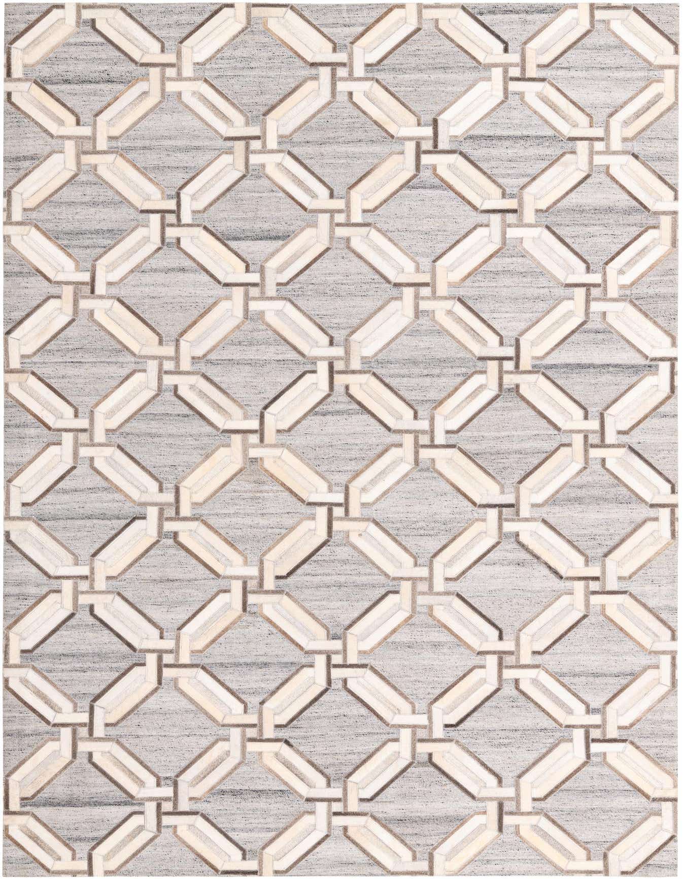 A 5x8 rectangular Cowhide rug in grays and silvers, featuring a modern geometric pattern of interlocking light gray and beige shapes.