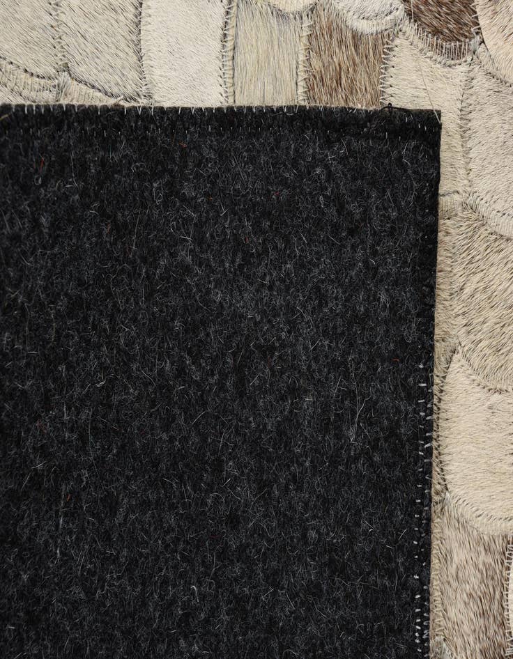 Detail image of  2' 1 x 3' Cowhide Rug