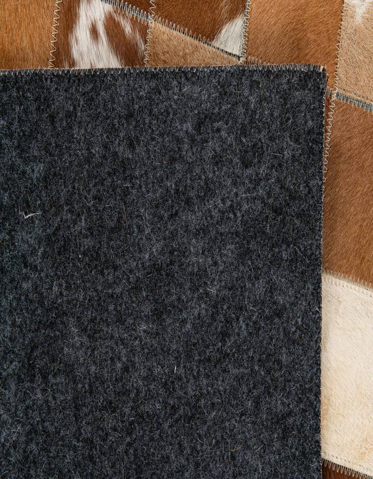 Detail image of  5' x 7' 11 Cowhide Stocks Rug