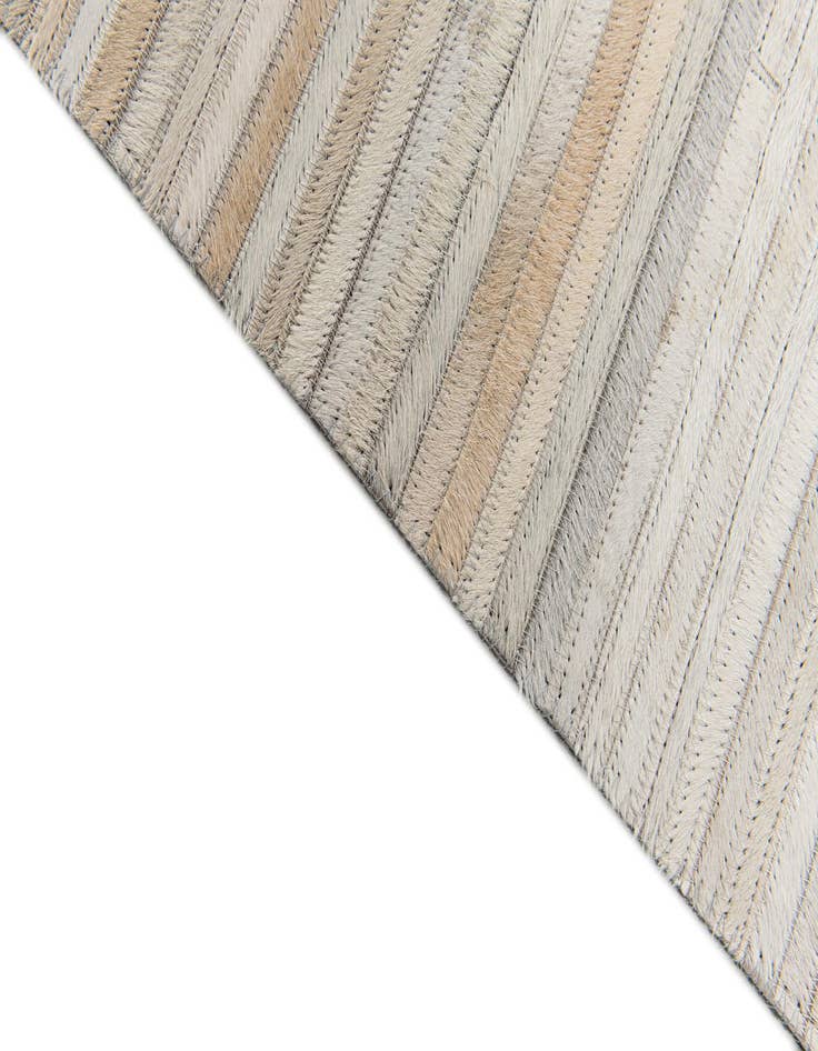 Detail image of  5' 1 x 8' Cowhide Stocks Rug