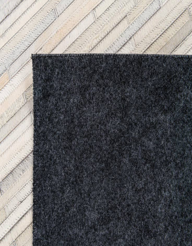 Detail image of  5' x 8' Cowhide Stocks Rug