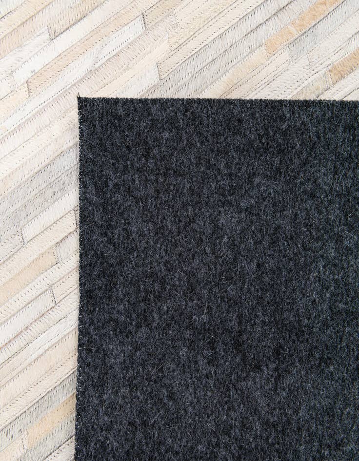 Detail image of  5' 1 x 7' 11 Cowhide Stocks Rug