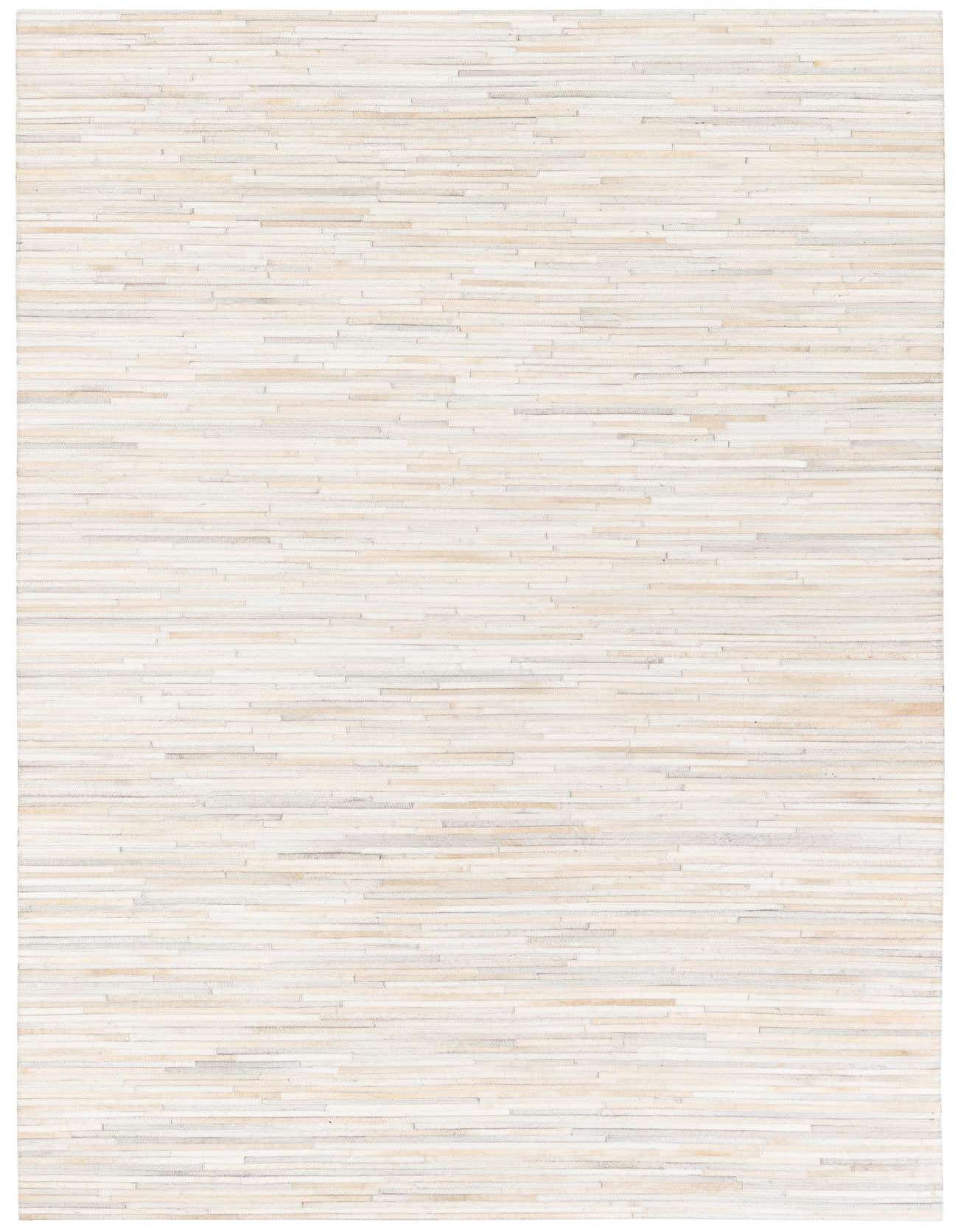 A rectangular 5x8 modern area rug featuring a patchwork of gray and silver cowhide strips, perfect for a living room.