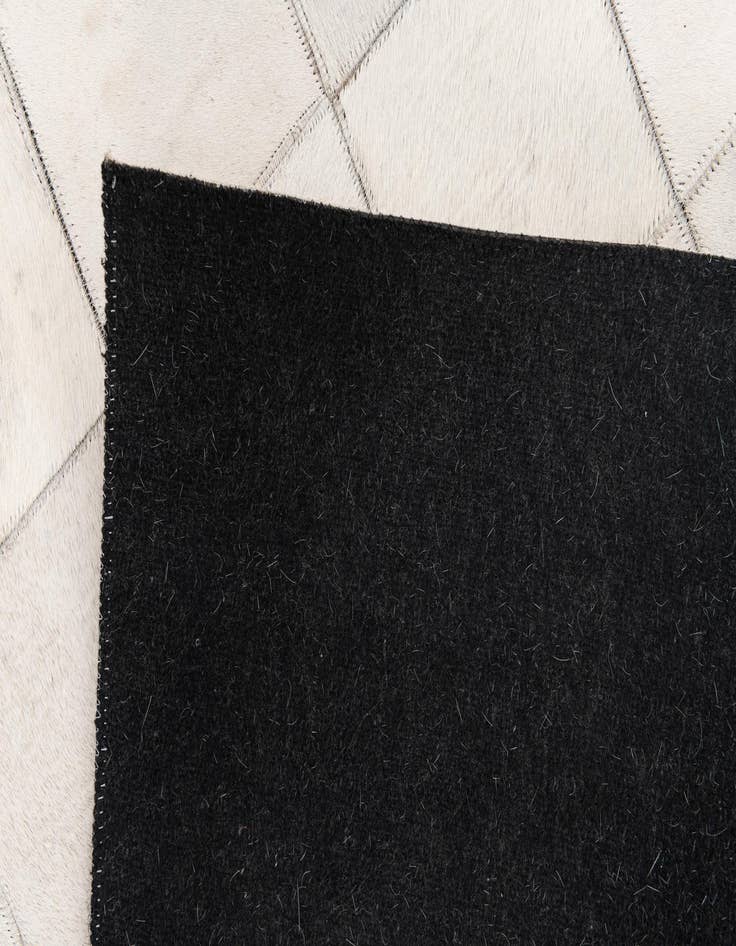 Detail image of  4' x 5' 10 Cowhide Stocks Rug