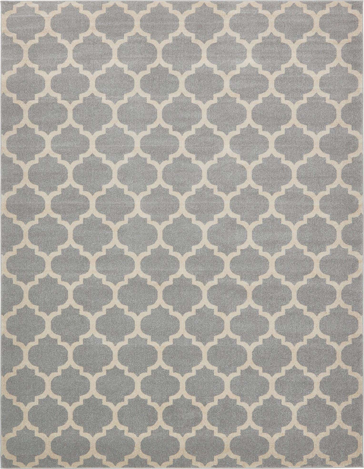 A 10x13 rectangular gray area rug featuring a repeating cream-colored modern trellis pattern, suitable for a living room.