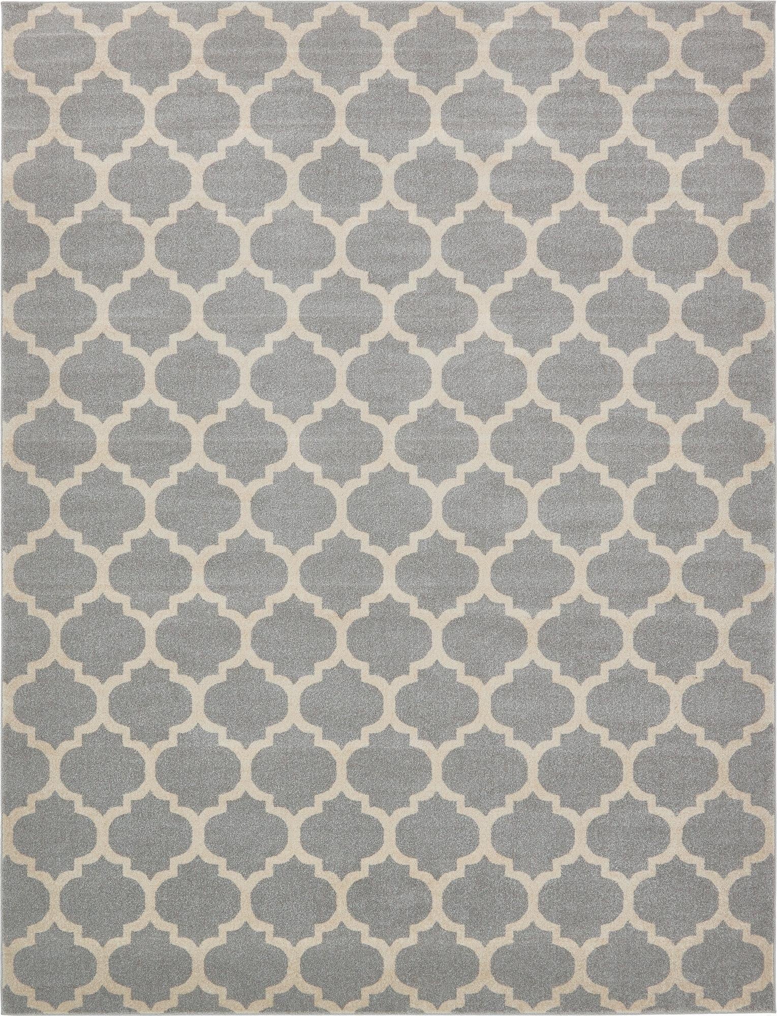 A 10x13 rectangular gray area rug featuring a repeating cream-colored modern trellis pattern, suitable for a living room.