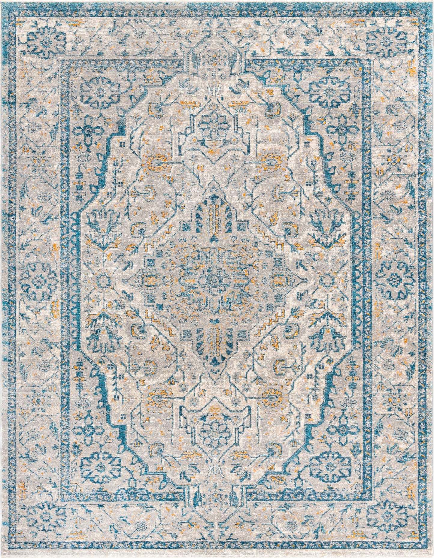 A 7x10 rectangular Lola Collection rug featuring a faded gray, blue, and gold bohemian medallion pattern.