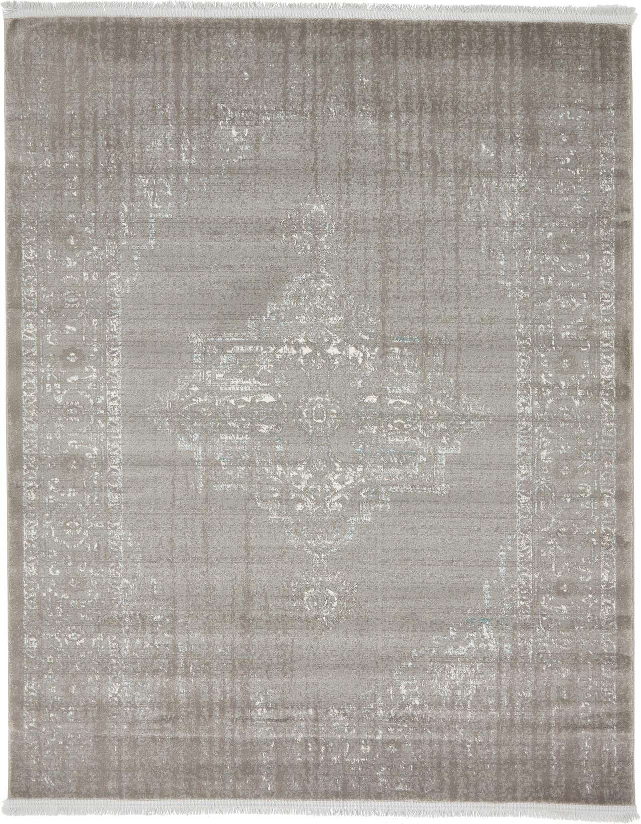 A 4x6 rectangular gray area rug with a faded traditional medallion pattern and short white fringe.