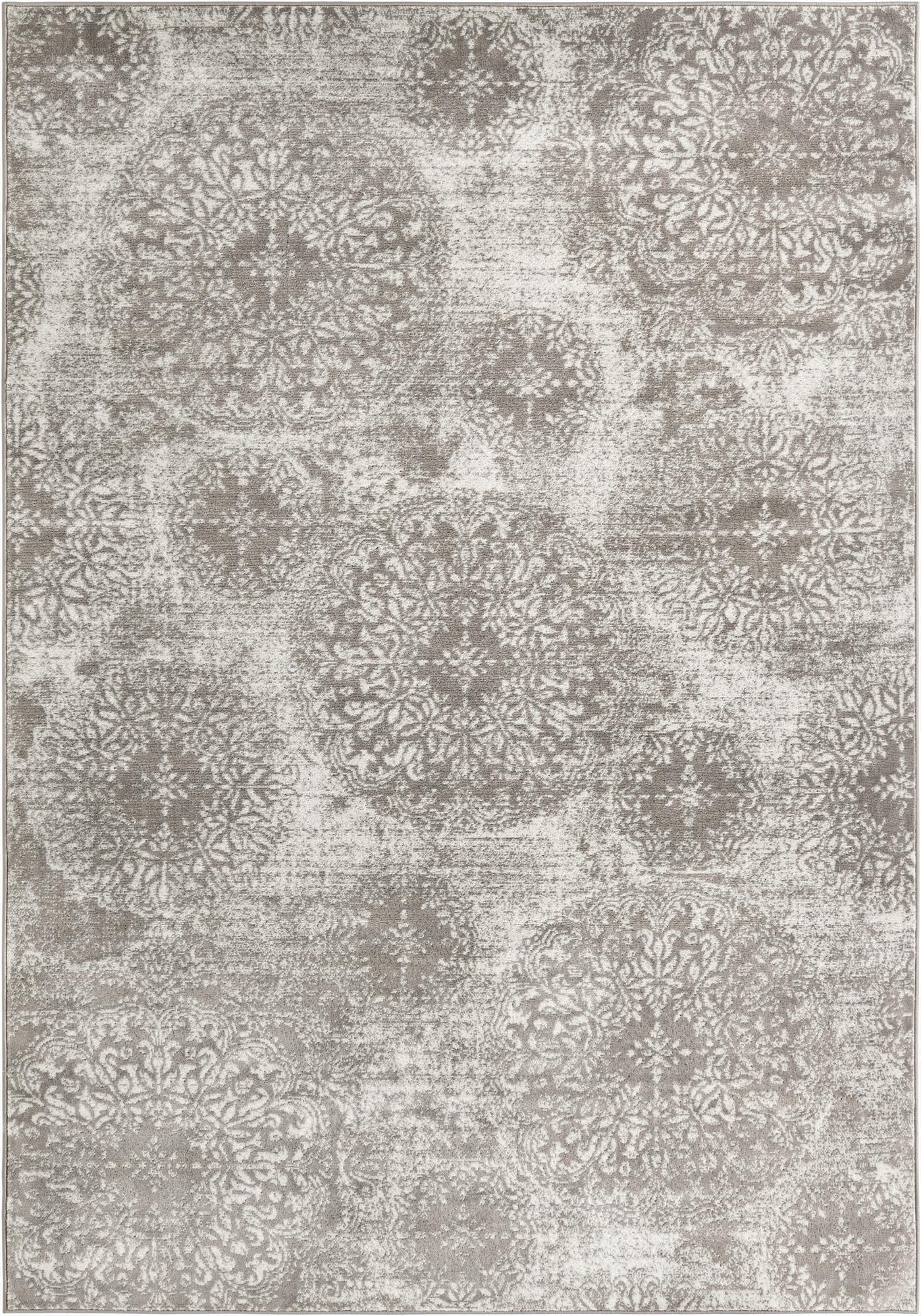 A 7x10 rectangular gray area rug with a distressed traditional floral medallion pattern, suitable for a living room.