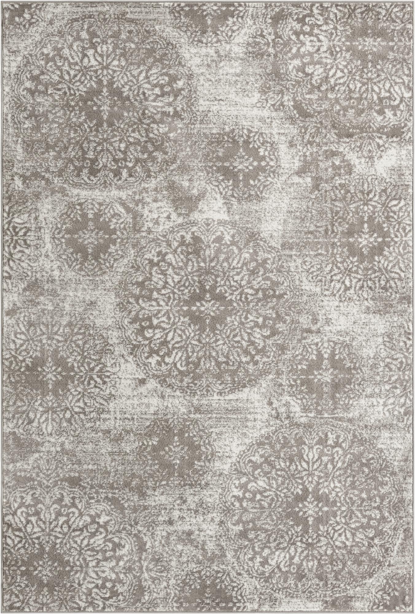 A 6x9 rectangular gray area rug featuring an ornate, distressed floral medallion pattern in light gray and silver tones.