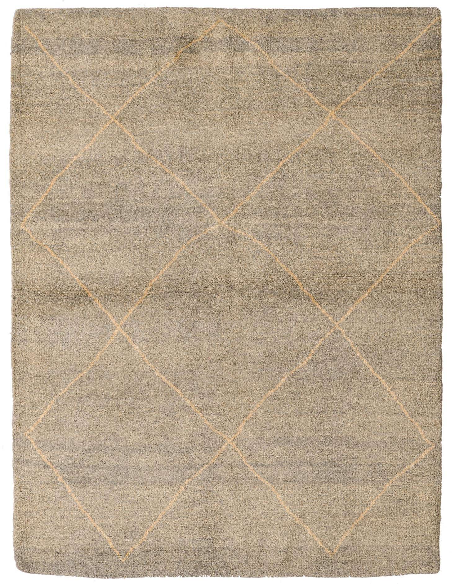 A 4x6 rectangular gray shag rug with a subtle cream tribal diamond pattern, ideal for a modern living room.