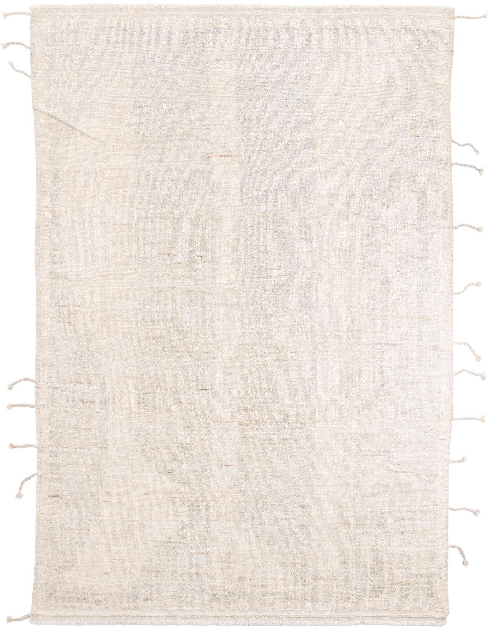 A rectangular 8x10 gray shag rug with subtle tribal patterns and fringed edges, ideal for a modern living room.