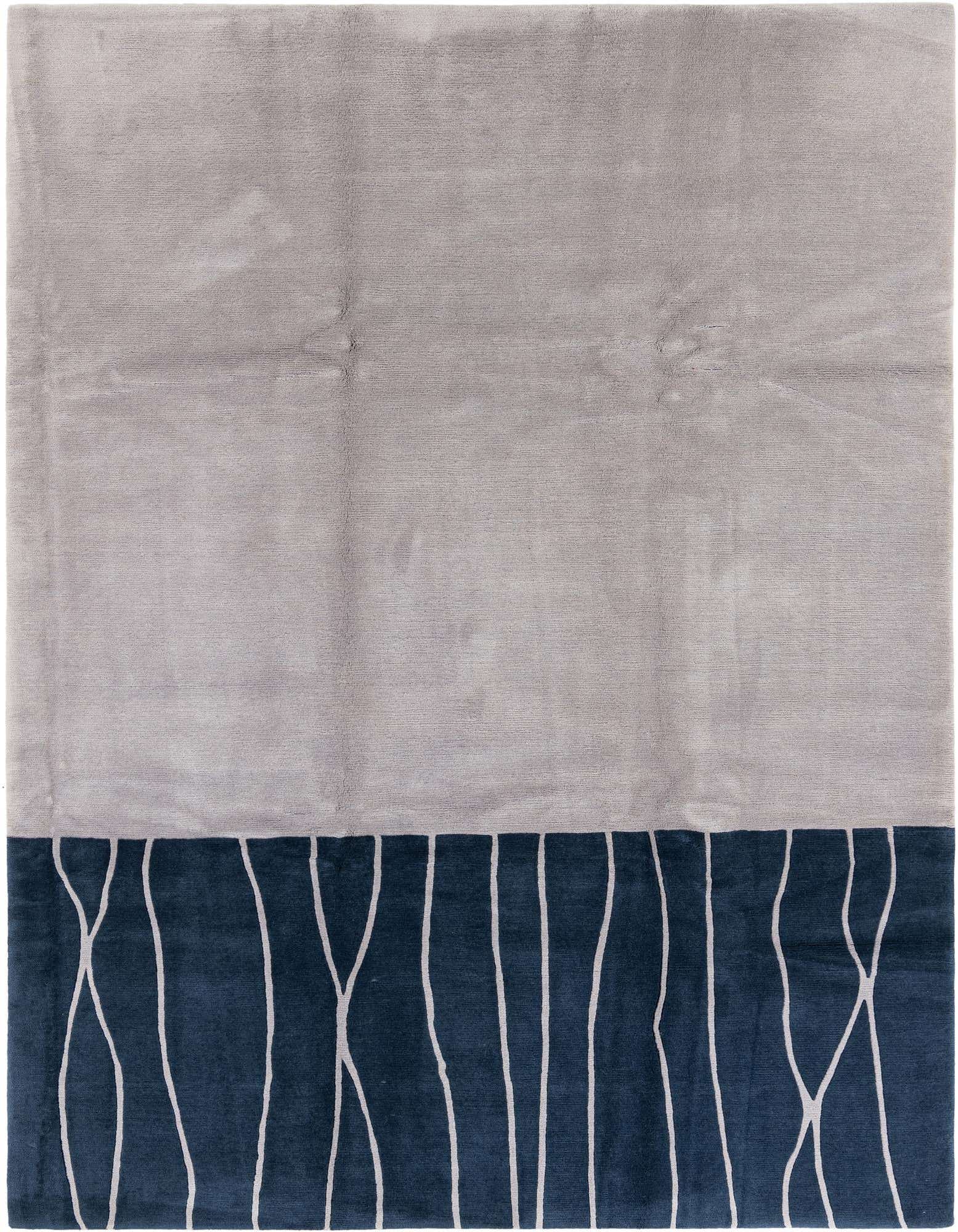 A rectangular 8x11 gray and navy blue modern wool rug with an abstract white line pattern at the bottom.