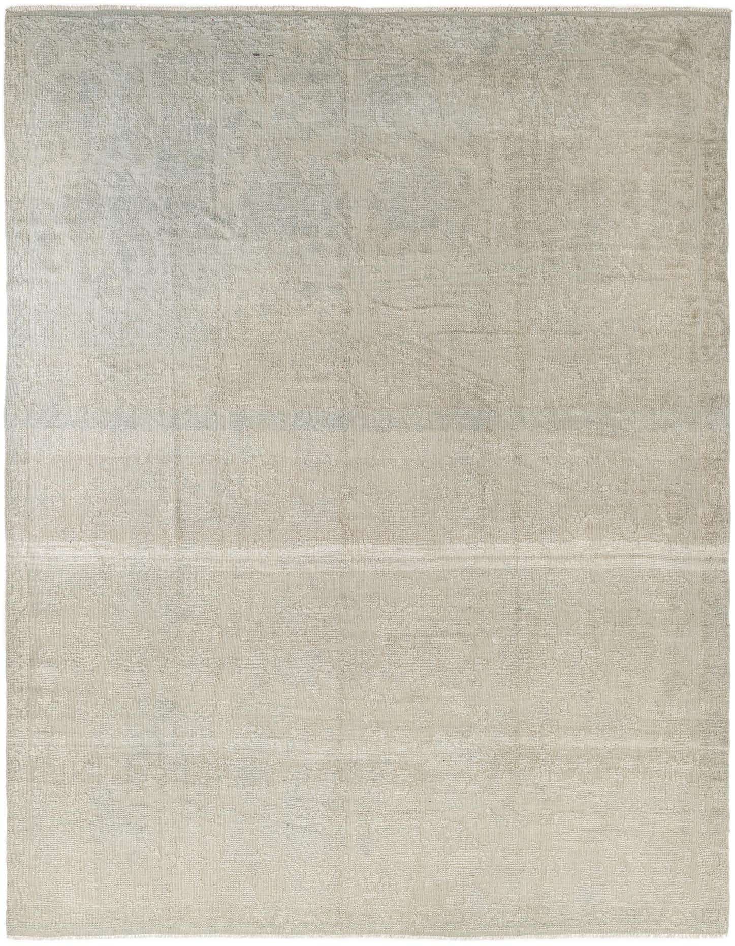 A 9x12 rectangular Oushak rug in varying shades of gray, featuring a subtle modern pattern.