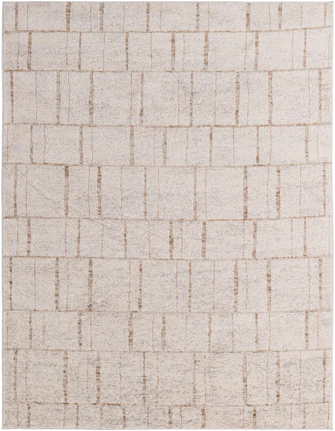 A 5x7 rectangular modern area rug featuring a textured block pattern in various shades of gray and silver.