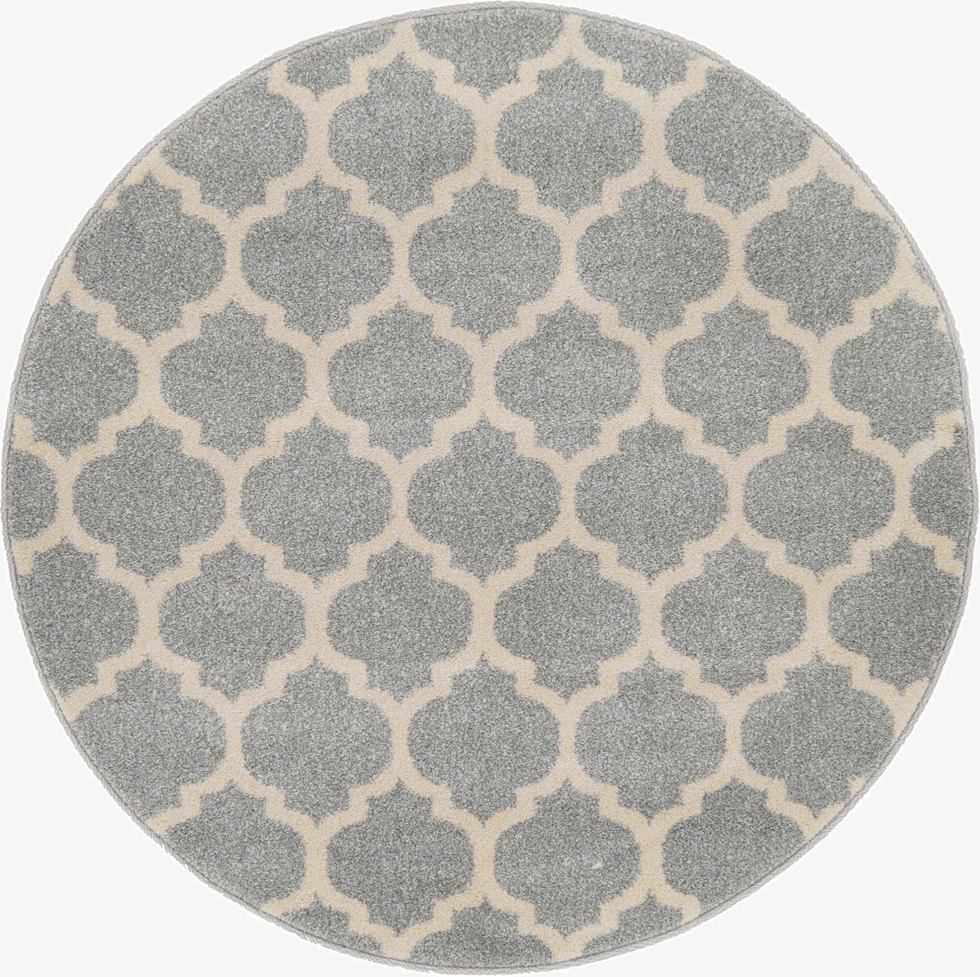A 3' round gray and cream modern trellis rug, perfect for adding a stylish touch to any indoor space.