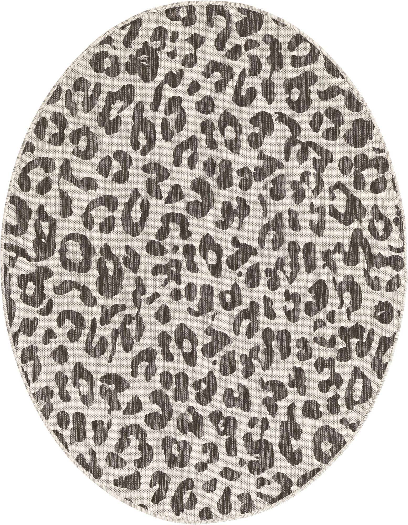 A 5' 3 round gray leopard print rug with a modern flatweave texture, suitable for indoor or outdoor use.