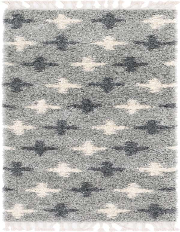 A gray 8 ft runner rug with a shag pile, featuring an abstract pattern of dark gray and cream crosses, with braided tassels.