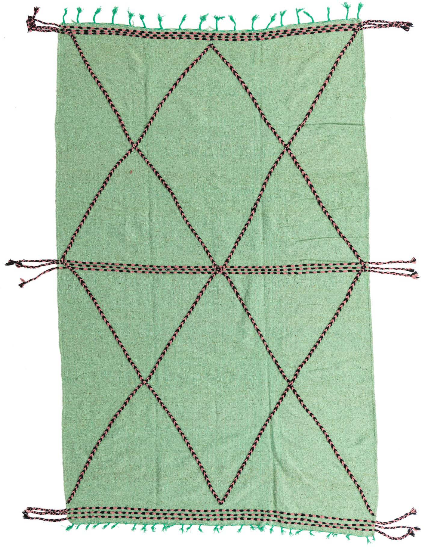 A 10x13 rectangular green shag rug with a black and pink braided tribal diamond pattern and green fringe.