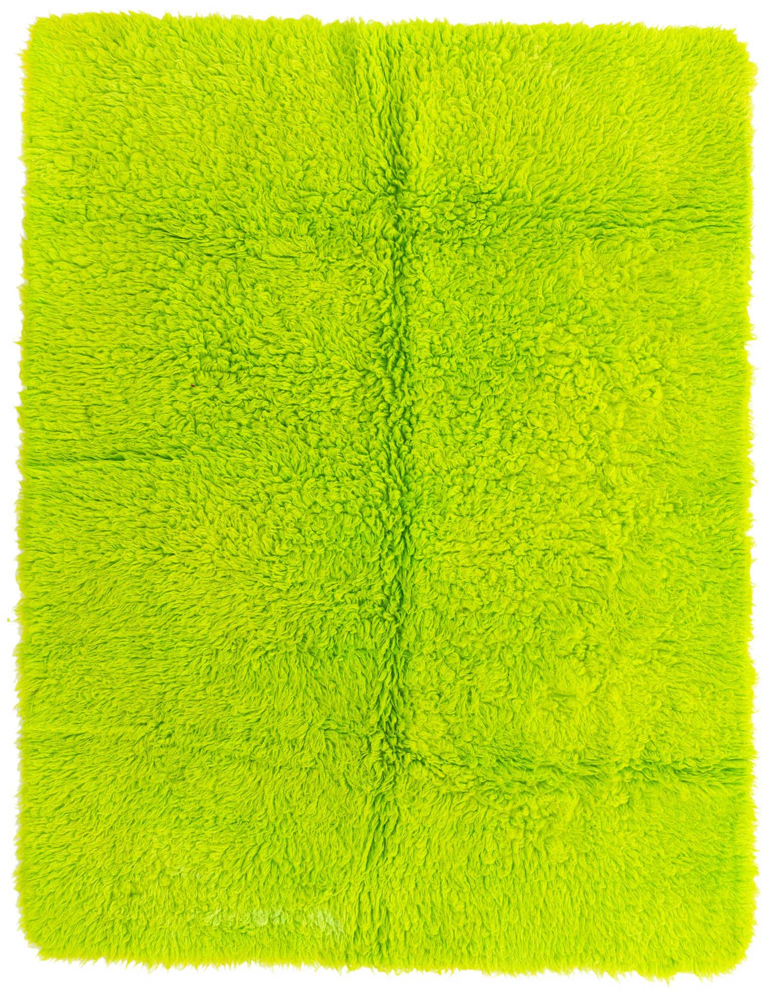 A vibrant 5x8 rectangular shag rug in a bright lime green color, made of soft wool.