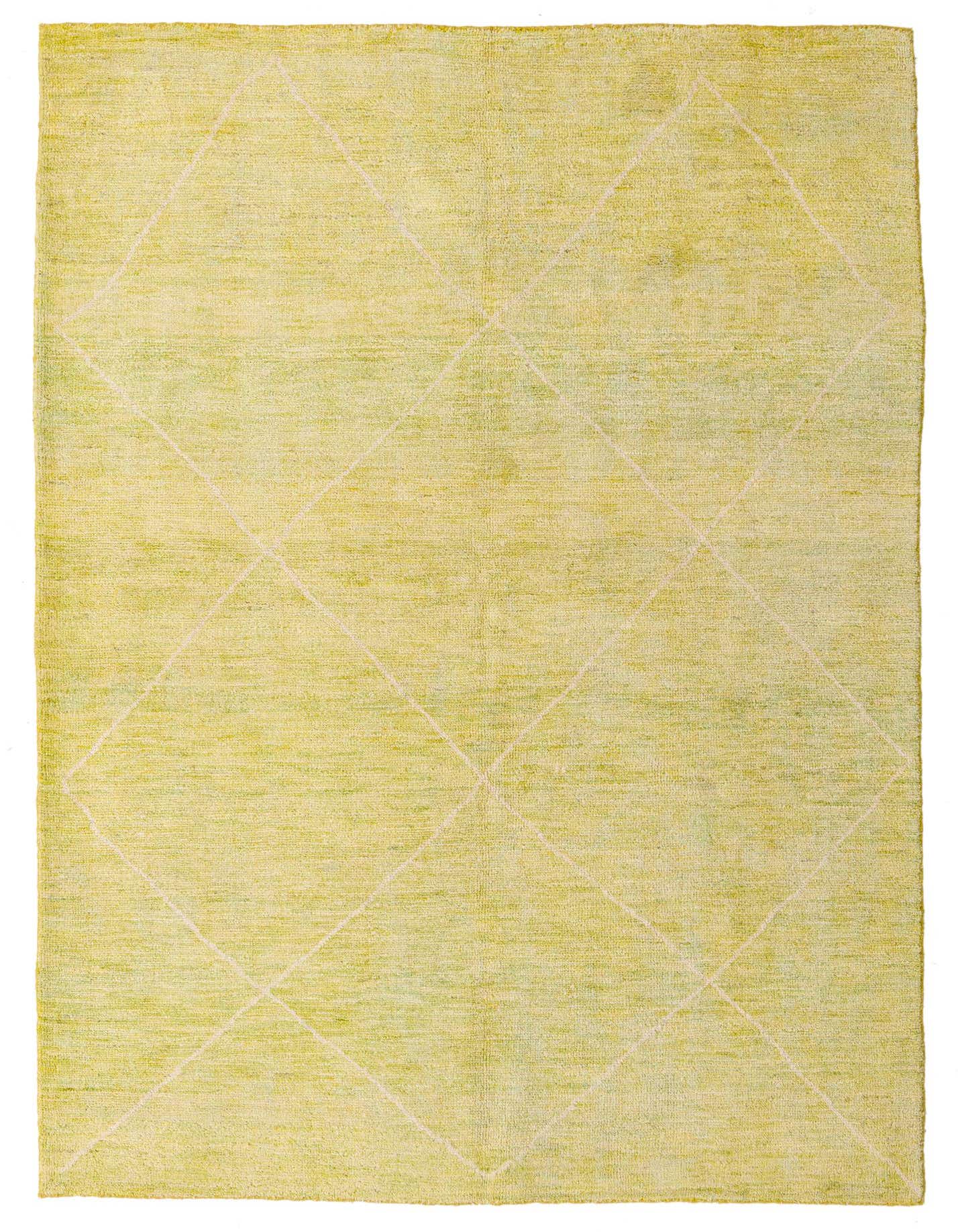 A 5x8 rectangular shag rug in varying shades of green with a subtle diamond tribal pattern.