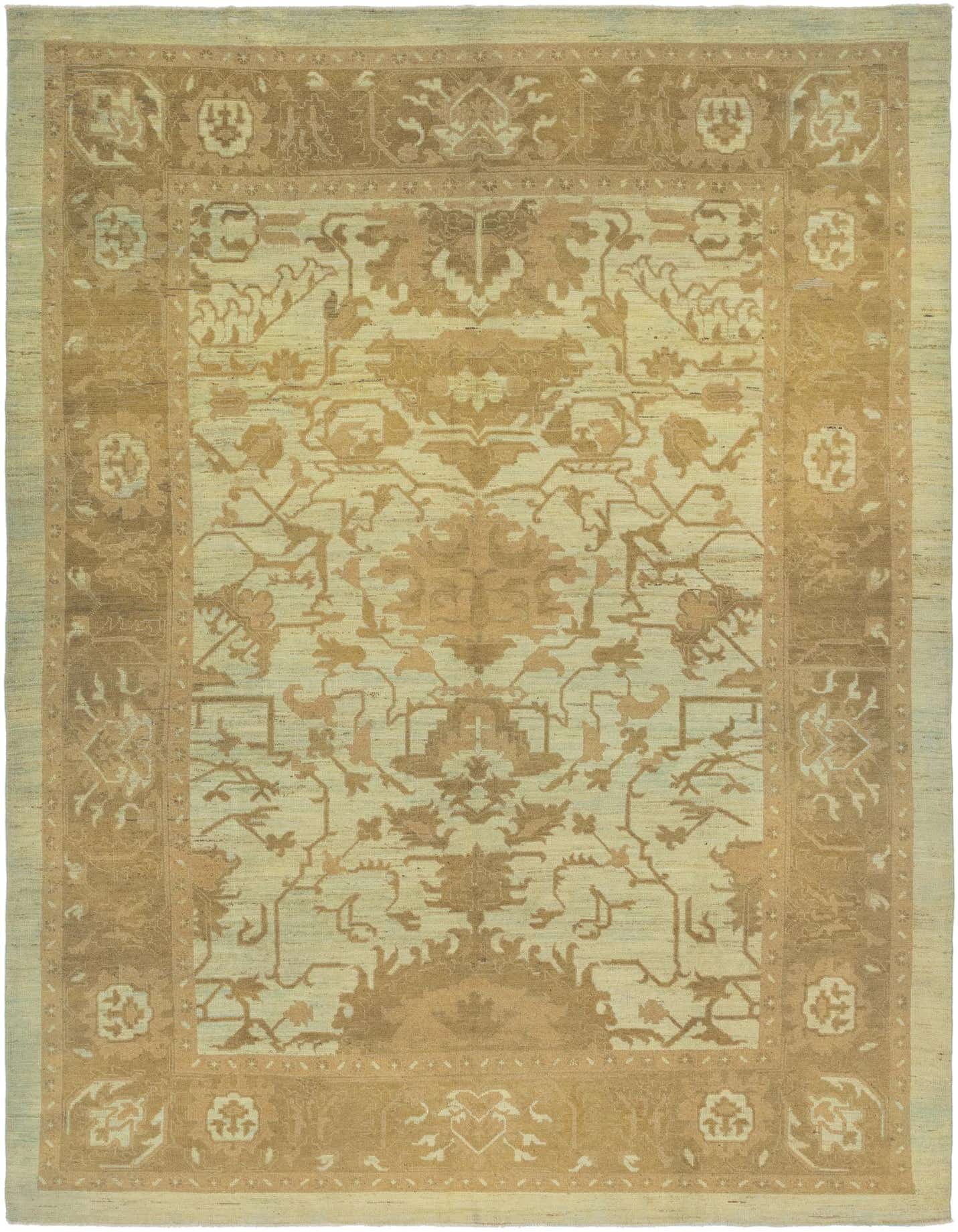 Rectangular Oushak rug in muted greens and warm gold, featuring an intricate traditional floral and tribal pattern with a wide border.