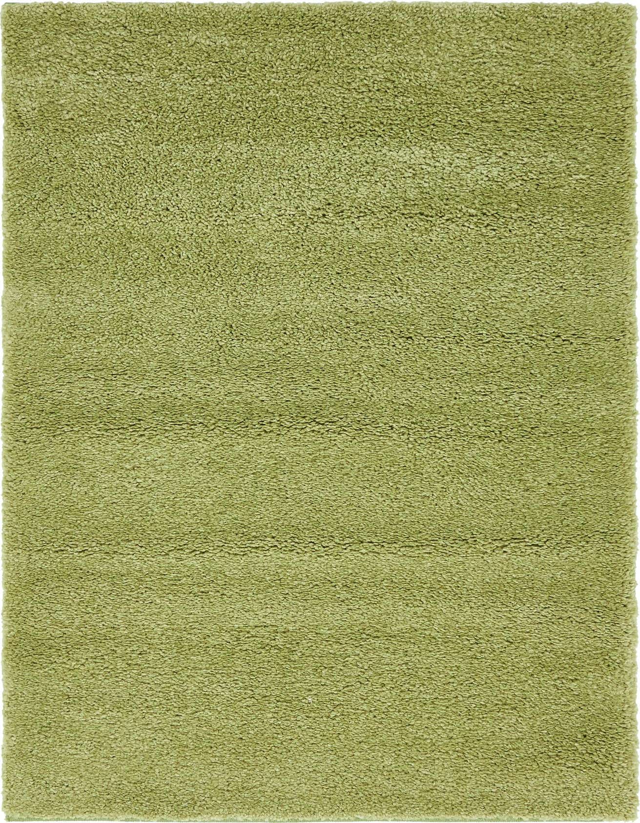 A rectangular 3x5 green shag rug with a soft, textured pile, perfect for adding comfort to any indoor space.