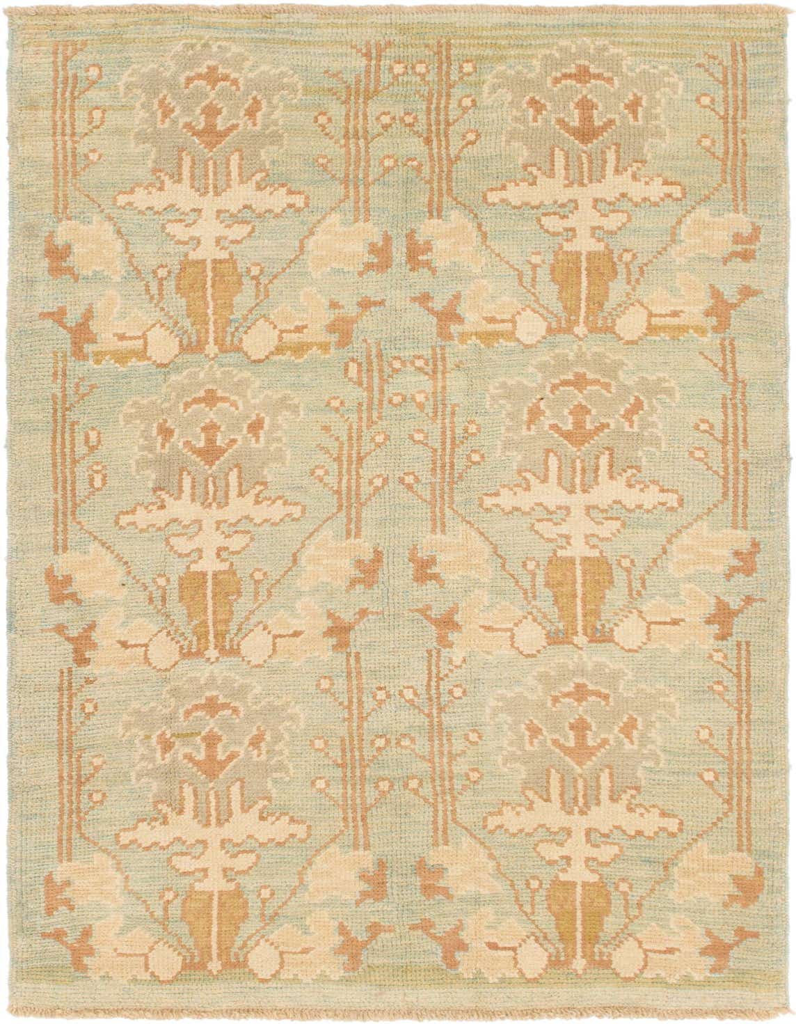 A handmade 8 ft Oushak runner rug in green, beige, and brown with a tribal, abstract pattern, ideal for a hallway or kitchen.