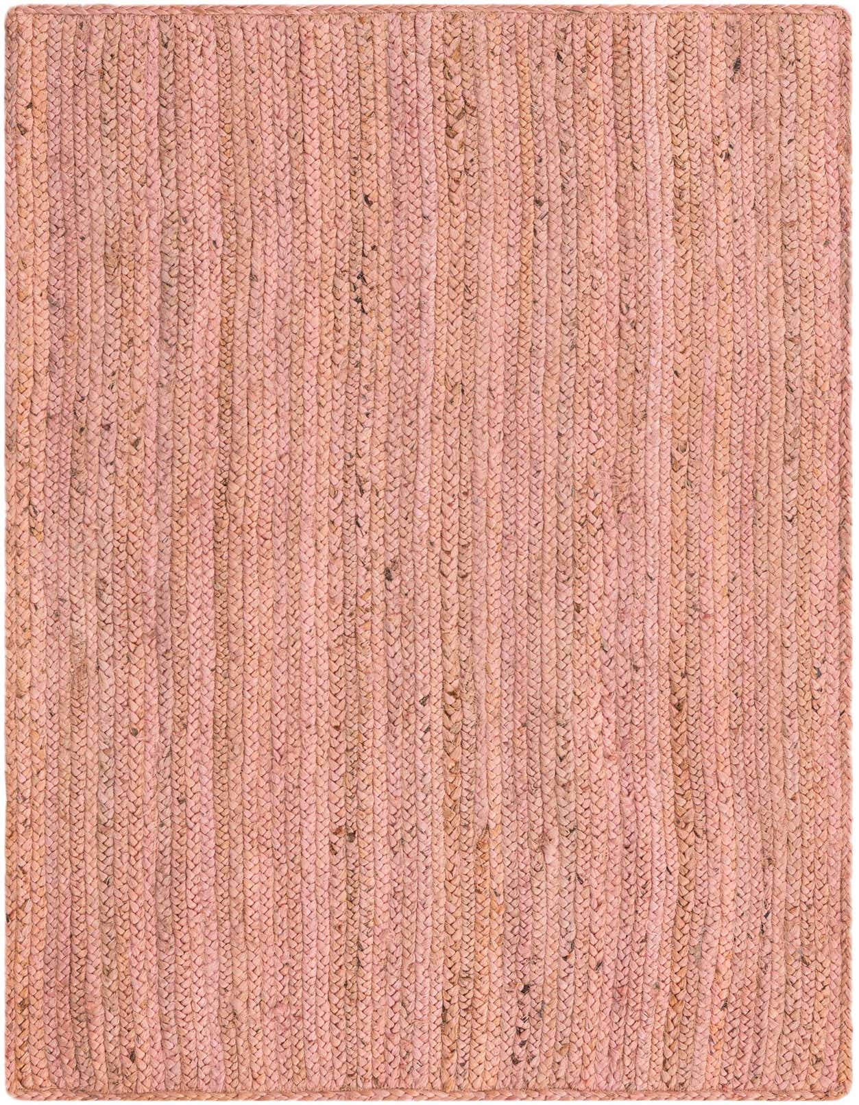 A 3x5 rectangular pink braided jute rug with a textured, flatweave construction, ideal for a minimalist or coastal indoor space.