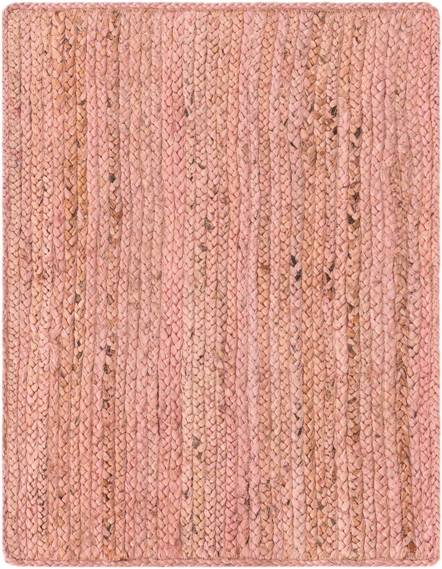 A 2x3 rectangular pink braided jute rug with a textured, flatweave construction, suitable for various indoor spaces.