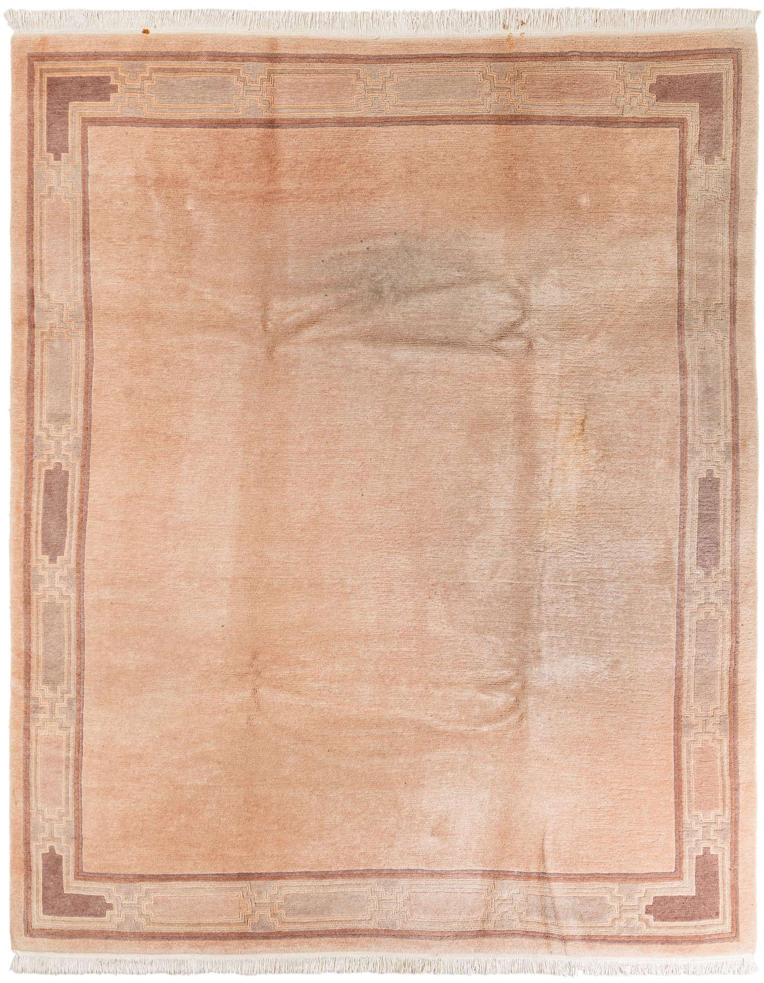 An 8x10 rectangular pink wool area rug with a modern oriental border pattern, suitable for a living room.