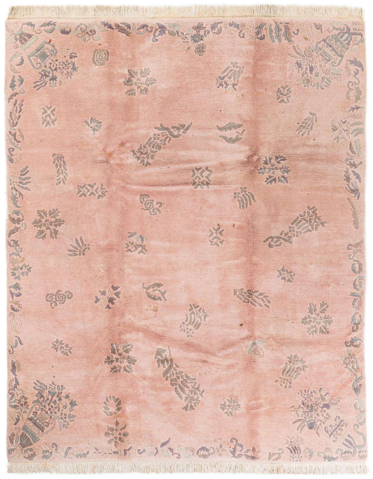 A 7x10 rectangular pink wool rug with a modern oriental abstract pattern in muted grey and blue tones, featuring a decorative border and short fringe.