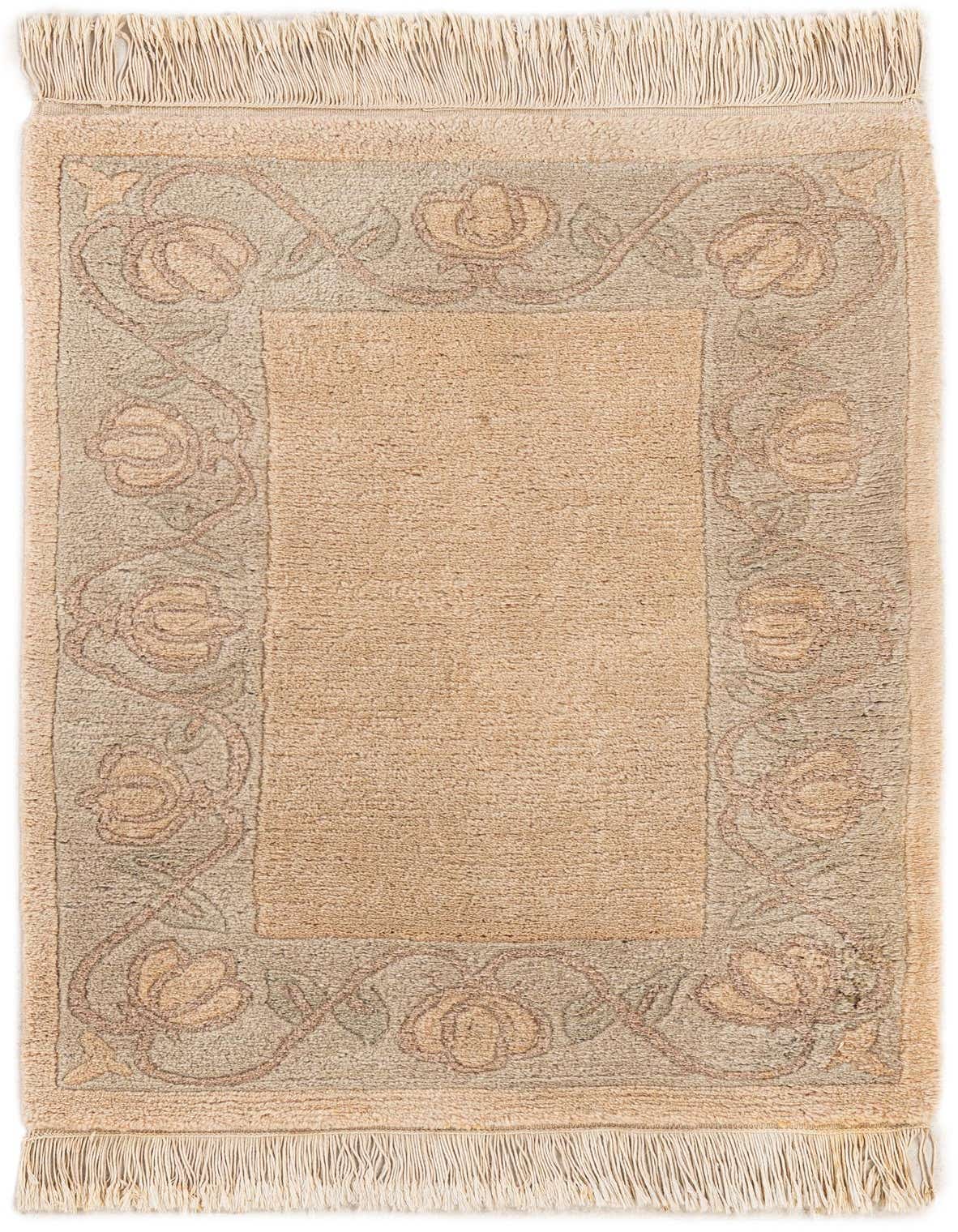 A 2x3 rectangular Rugs.com Tibet rug featuring a soft pink center with an intricate light green and pink floral border, finished with fringe.