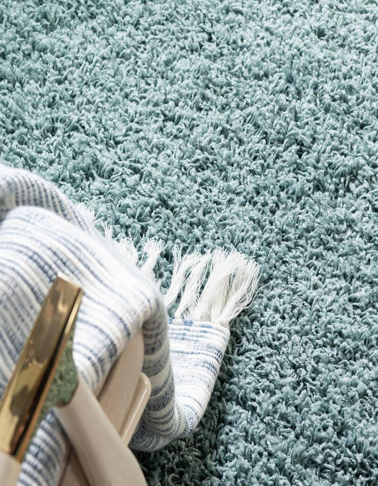 Detail image of  5' 3 x 8' Solid Shag Oval Rug