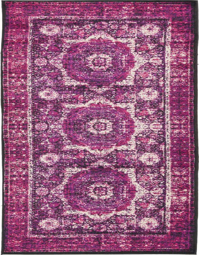 A 10 ft runner rug in shades of pink and purple with a distressed medallion and botanical pattern, perfect for a hallway.