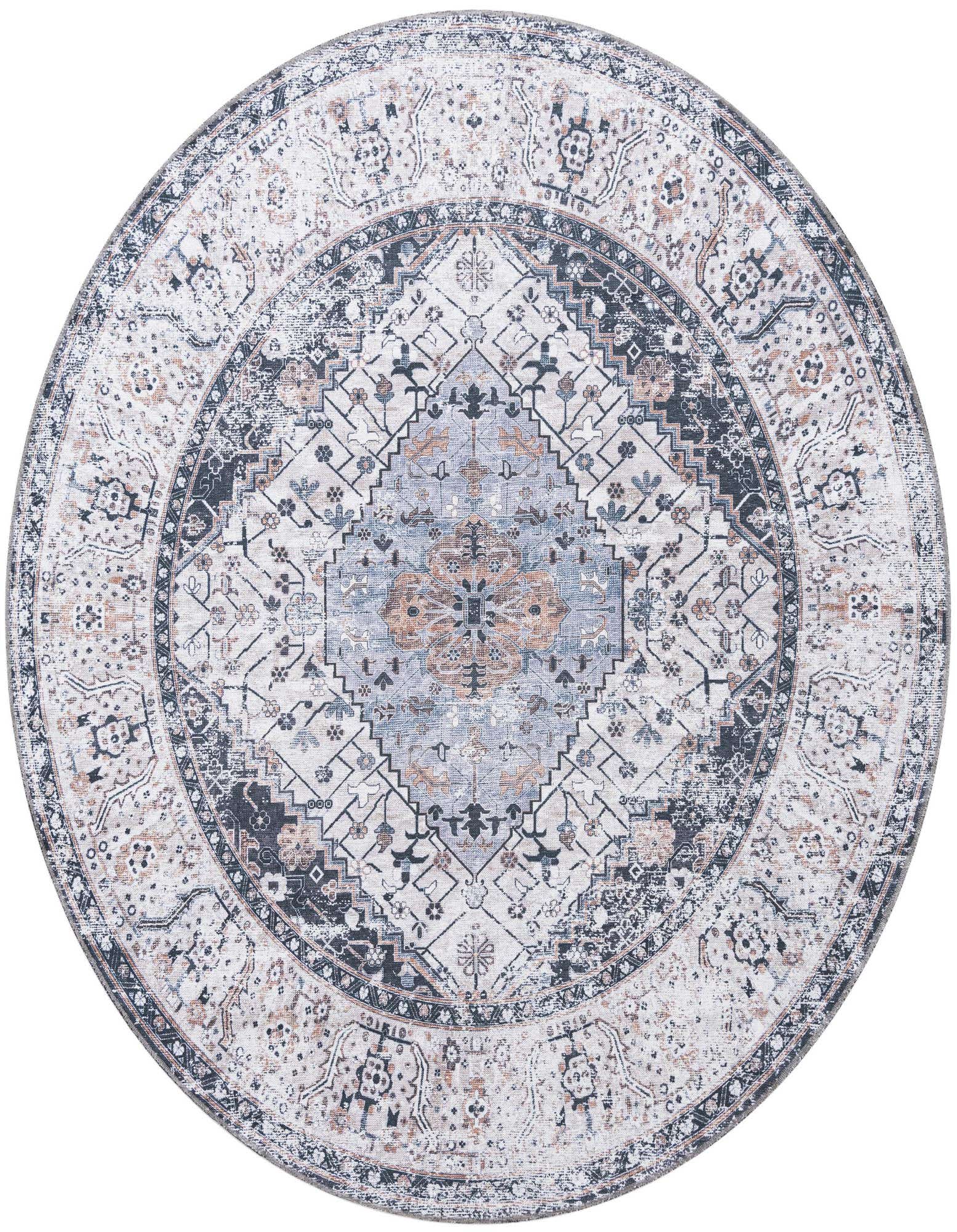 A round 7' 10" black, ivory, and gray tribal medallion rug with a distressed bohemian pattern.