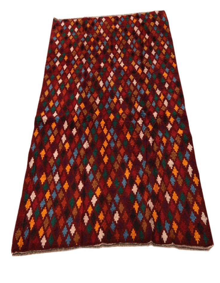 Detail image of  4' 1 x 5' 8  Hand Knotted Balouch Wool Rug