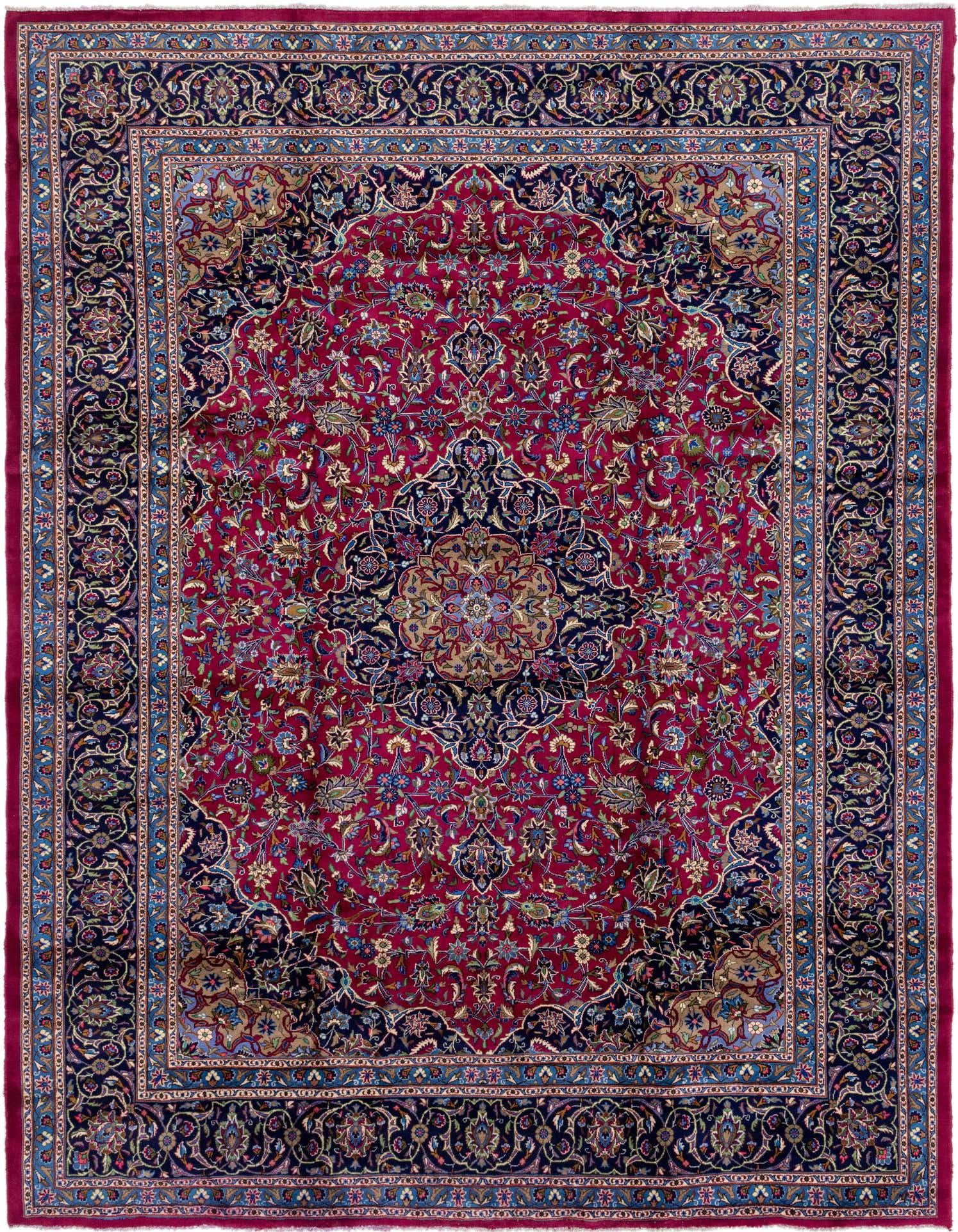 A large 10x13 rectangular Persian rug with a rich red field, intricate botanical patterns, and a central medallion, framed by a dark blue border.