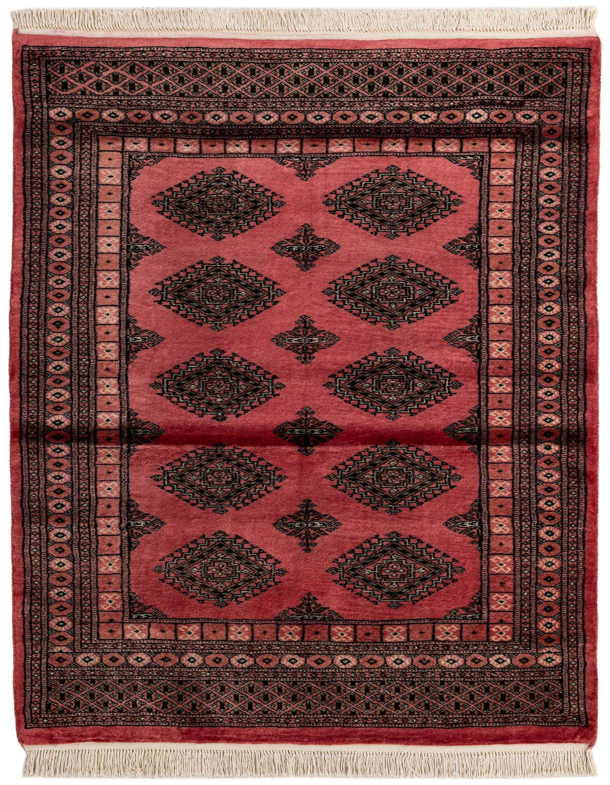 A 4x6 rectangular Torkaman wool rug in shades of pink and red, featuring traditional Persian geometric patterns and a medium pile.