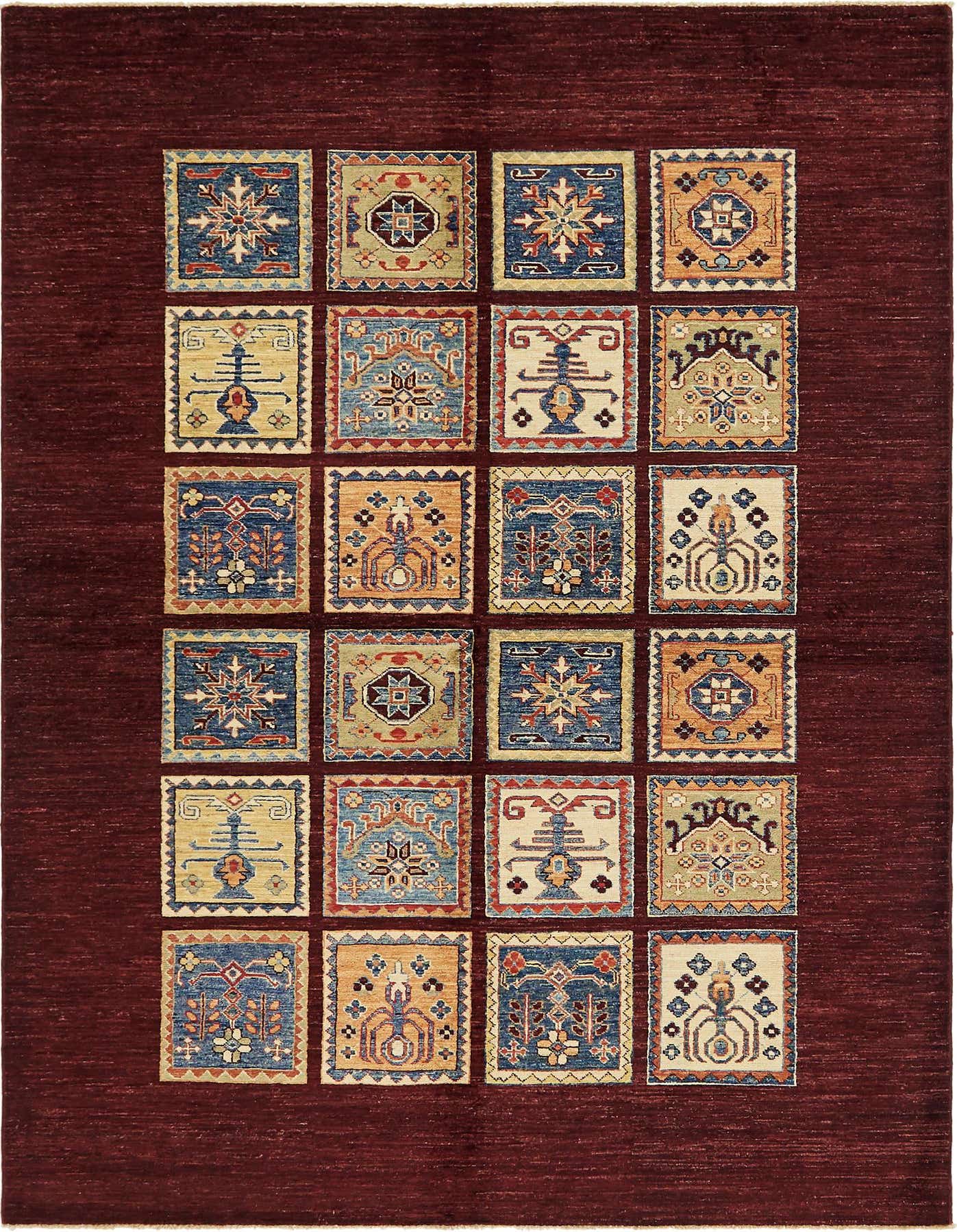 A 6x9 rectangular Ariana Ziegler rug featuring a deep red border and a grid of colorful traditional tribal patterns in blue, gold, and cream.