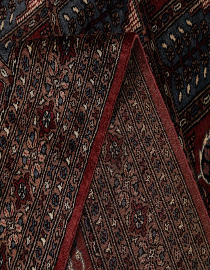 Detail image of  6' x 9'  Hand Knotted Bokhara Oriental Wool Rug