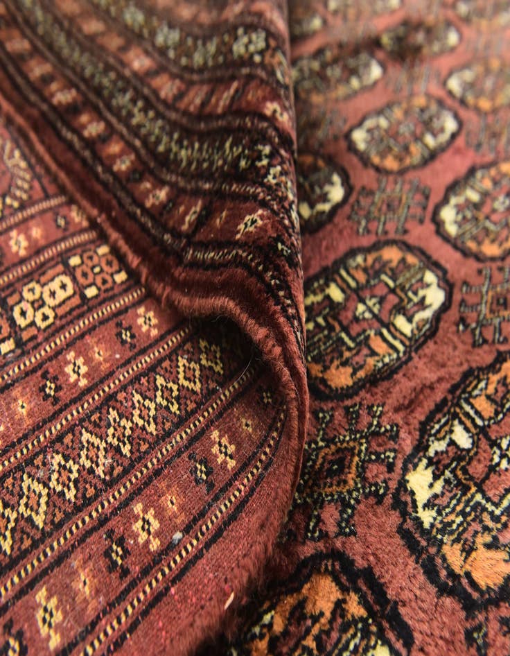 Detail image of  7' x 9'  Hand Knotted Bokhara Oriental Wool Rug