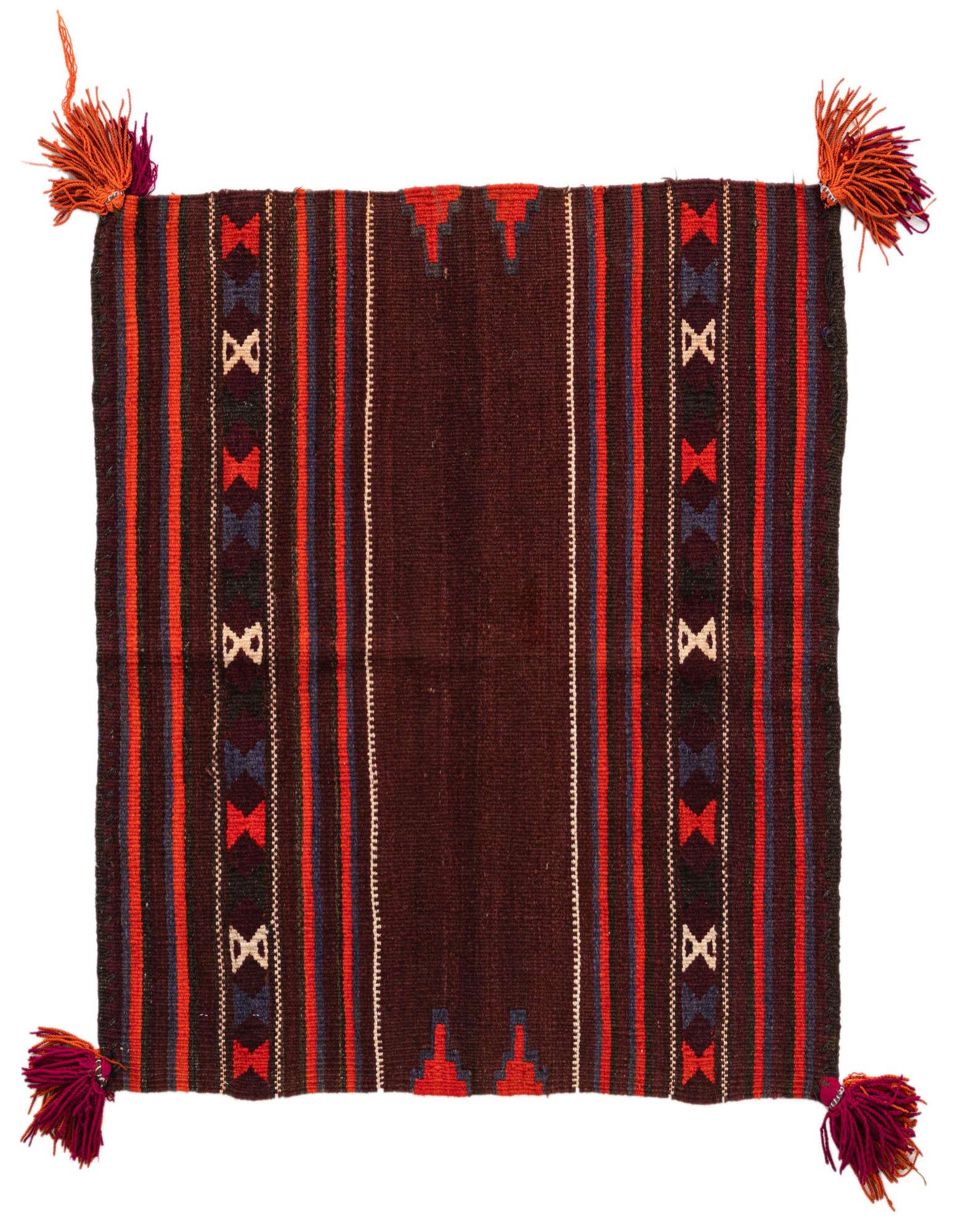 A 3' 4 x 3' 5 square Kilim Modern wool rug featuring a tribal pattern in reds, black, and blue with decorative tassels.