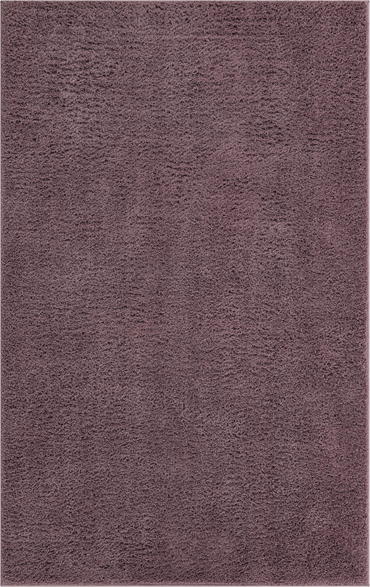 A 5x8 rectangular purple shag rug with a textured, high pile, perfect for a modern living room or bedroom.