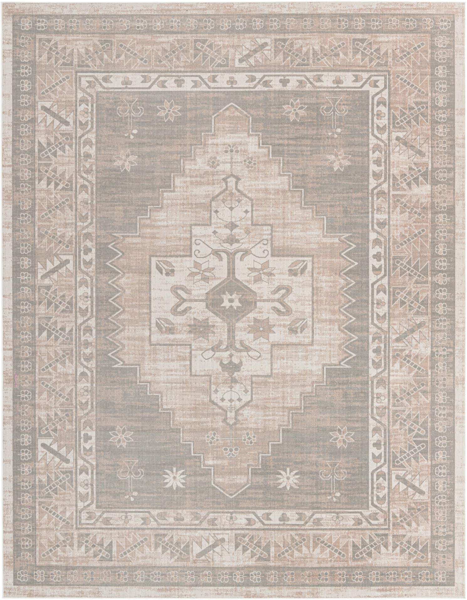 A 9x12 rectangular Whitney collection rug featuring a distressed tribal medallion pattern in browns, tans, and creams.