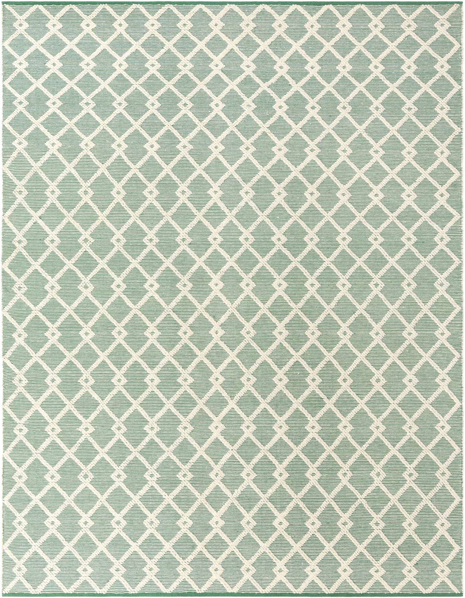 A 9x12 rectangular Jill Zarin Dorset rug featuring a repeating geometric diamond pattern in light green and cream.