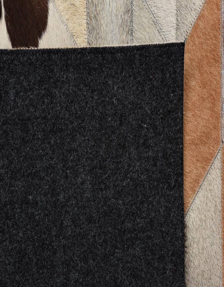 Detail image of  4' 8 x 6' 5 Cowhide Rug