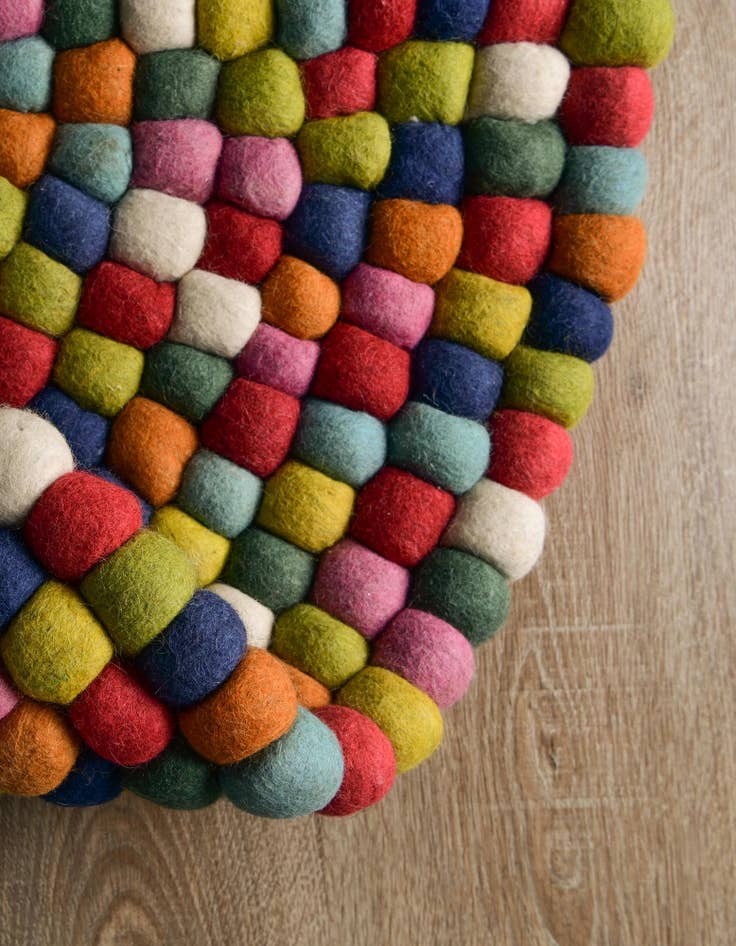 Detail image of  2' 2 x 3' 7 Felt Ball Wool Hearth Rug